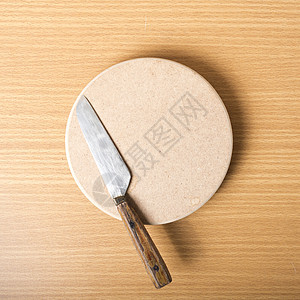刀和刀板厨师金属食物桌子工具木板木头棕色烹饪屠夫图片