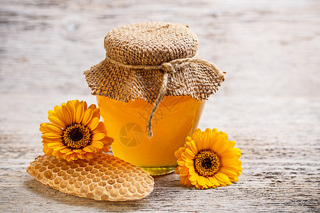 蜂蜜罐产品治愈木头甜点养蜂业液体营养静物食物蜂蜜图片