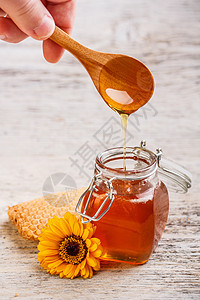 亲爱的蜂蜜勺子毛毛雨早餐梳子食物营养黄色玻璃金子图片