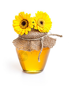 蜂蜜罐花蜜玻璃蜂蜜食物金子液体乡村黄色白色营养高清图片