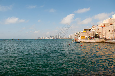 现代特拉维夫的景象来自旧城蓝色假期街道海岸海浪海岸线城市生活海滩游客图片