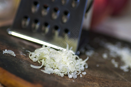 厨房电器格拉特和磨制奶酪美食食物砧板电器厨房厨具背景