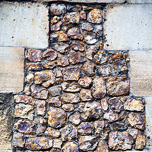 英国伦敦的墙壁和地上的石块建筑学黏土房子岩石墙纸砖墙材料石头地面瓦砾图片
