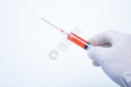 持有红色注射针筒医院医生白色帮助药品诊所医疗工具疫苗乐器图片