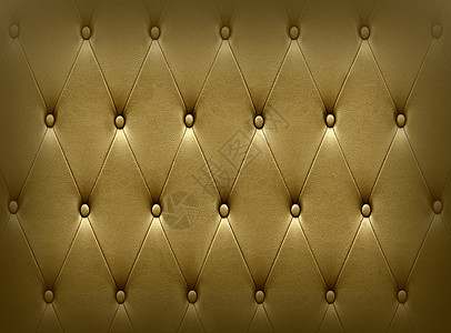 奢华的深金色皮革座椅软垫魅力风格扶手宏观墙纸座位按钮材料质量装饰图片