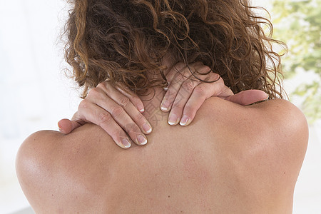 女人的脖子和肩部疼痛治疗身体脊椎女孩卫生按摩手指颈部压力医疗图片