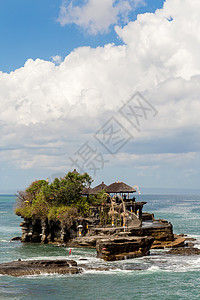 印度尼西亚巴厘岛海边精神游客建筑学建筑传统海浪异国悬崖寺庙宗教图片