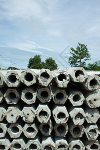六边形混凝土堆积体工具砂浆障碍建设者水泥管道柱子管子圆形导管图片