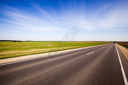 公路道路曲线旅行草地季节土地街道运输阳光场地车道图片