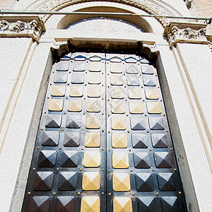 古老的门 在意大利式旧木和传统质地装饰品出口入口安全金属螺栓古董建筑装饰指甲图片