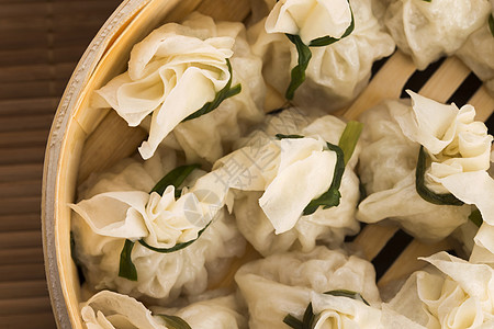 竹蒸汽船中中国的燕子饮茶美食午餐猪肉地面早餐碎麦盖子食物盘子图片