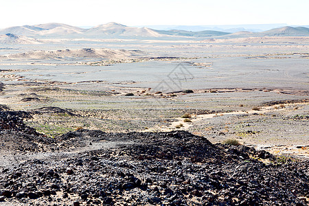 莫罗科沙哈拉沙漠中的古老山地化石图片