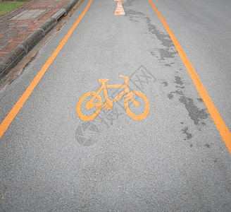 自行车车道街道沥青骑术绿色运输白色城市路面安全小路图片