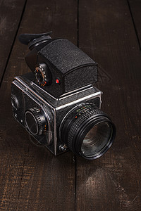 古旧胶片照相机乡愁摄影师相机电影照片创造力桌子宏观黑色技术图片