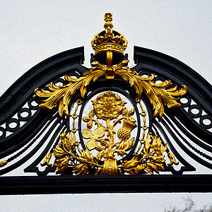 在英格兰的隆登 旧金属大门皇宫堡垒艺术旅游街道历史性家庭王国狮子雕塑国王图片