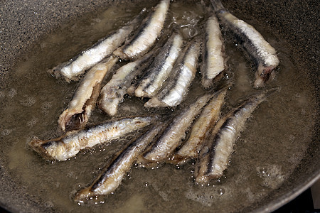 油炸凤尾鱼午餐食物鳀鱼饮食柠檬餐厅盘子美食海鲜乡村图片