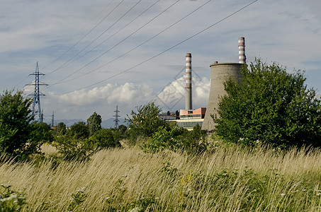 热电发电厂的距离视距观察黄色导体金子电力衬套金属树木植物绿色蓝色图片