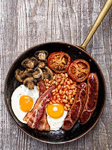 质朴的全套英式早餐美食英语豆子食物熏肉油炸育肥疾病香肠黄油图片