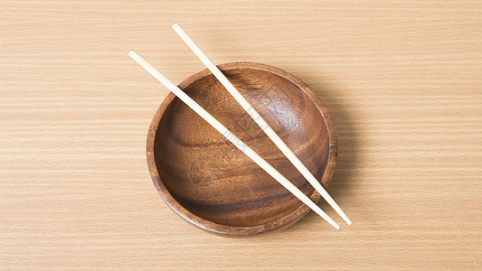 带筷子的空碗勺子黑色食物竹子盘子圆形木头餐厅文化美食图片