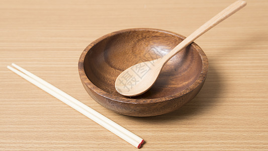 带筷子的空碗餐厅圆形美食竹子用具文化盘子勺子棕色木头图片