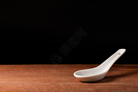 白瓷勺食物粉末向日葵芳香草本植物种子红花素食者大豆调味品图片