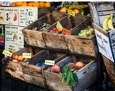 年老的绿色杂农工佛罗伦萨橙子水果板条箱情绪案例架子盒子桃子市场商业图片