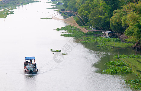 漂浮在湄公河的货船旅行运河假期女士蓝色运输水手衬套旅游丛林图片