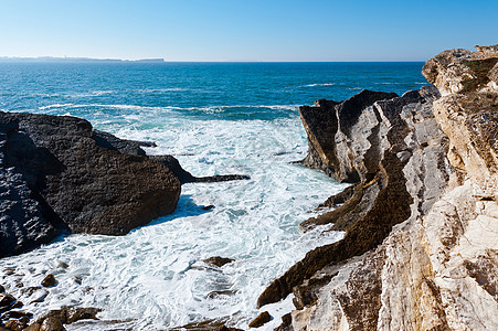 落岩海岸海岸线海洋支撑飞溅海景薄雾悬崖岩石泡沫蓝色图片