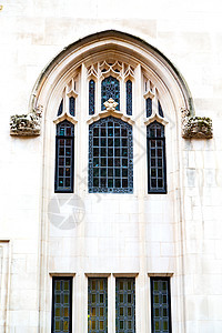 在英国砖块和玻璃墙壁中住宅房子财产纪念碑建筑学窗户石头英语柱子地标图片