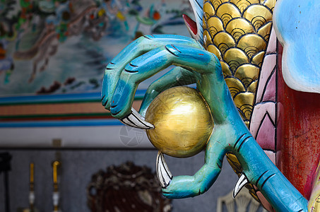中国龙爪脚 泰国的中国庙宇闪色信仰雕像动物寺庙天空新年艺术家怪物手指图片