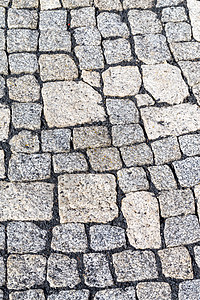 详细描述街道的可塑石石头石膏石材景观小膏药密封城市砌块海豹路面背景图片