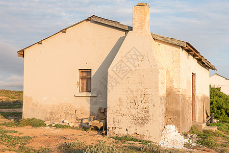 日落时 帕彭多尔普的废墟阳光房子村庄历史性街景多云图片