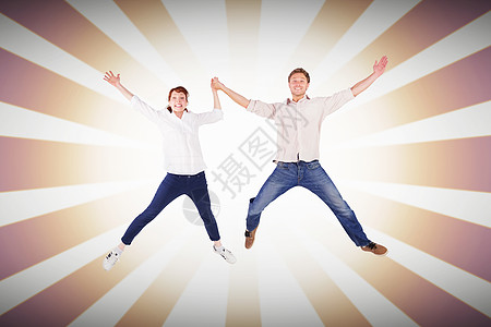 情侣跳跃和握手的复合图像喜悦乐趣享受双手情怀娱乐性男人感情浪漫红发背景图片