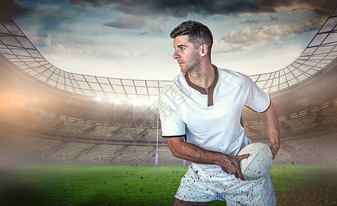 橄榄球玩家将球搁置一边的复合图像图片