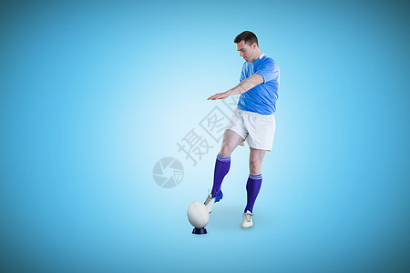 橄榄球玩家跳踢足球的复合图像分数专注蓝色数字竞赛播放器插图计算机男人男性图片