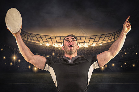 橄榄球运动员与球一起欢乐的复合图像世界足球欣快感男性胜利肌肉播放器球衣专注优胜者图片