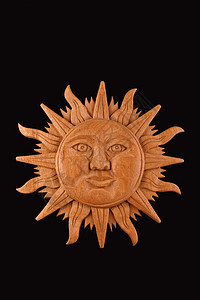 墨西哥木雕的马雅太阳符号板 被黑色隔绝背景图片