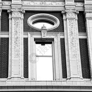 欧洲伦敦红砖墙的旧窗口和历史文档中的旧窗口旅行建筑学窗户阳台乡村废墟建筑旅游办公室文化背景图片