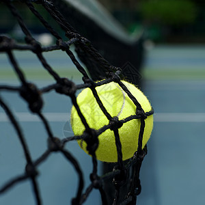 在网的网球绿色法庭球拍闲暇游戏竞技运动个人竞赛图片