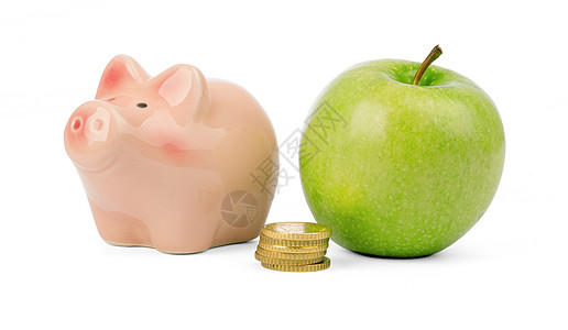 苹果和钱素材新鲜苹果 有硬币和小猪银行背景