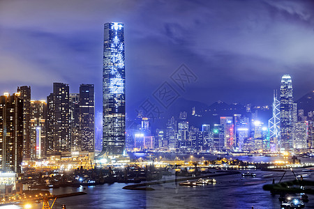 香港夜金融运输结构建筑消失摩天大楼银行蓝色窗户城市背景图片