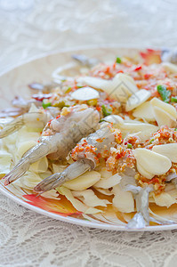 辣椒鱼酱生虾食物沙拉团体黄色草药贝类午餐美食白色海鲜图片