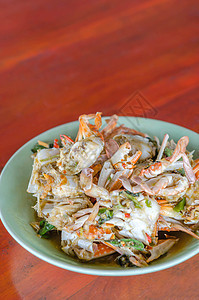 丝状炒螃蟹牡蛎叶子蔬菜红色食物油炸绿色香料美食海鲜图片
