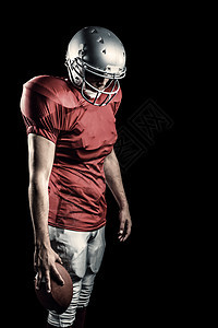美式足球运动员的复合图像 球向下仰望运动男人竞技服装混血体育运动服竞赛安全团队图片