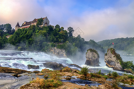 瑞士莱茵瀑布旅行观光岩石犀牛城堡绿色水流溪流地标灰色图片
