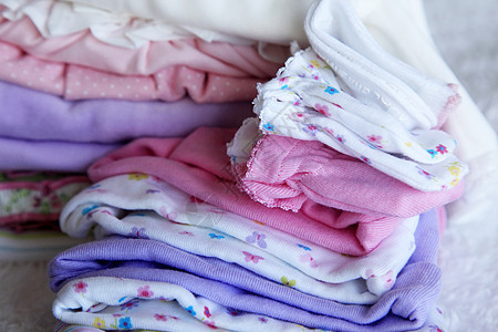 婴儿衣体折叠白色短袜衣服圆点服装织物纺织品女孩裙子图片