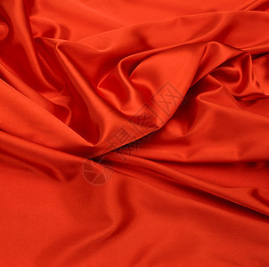 红丝丝织物背景亚麻海浪红色柔软度光泽溪流寝具材料窗帘天鹅绒图片