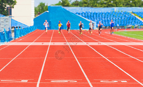 男运动员游戏尖刺赛跑者竞争竞技跑步者训练跑步体育场红色图片