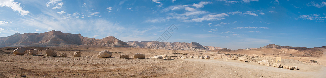 沙漠石头Negev 沙漠全景视图远足天空蓝色石头山脉旅行游客旅游背景