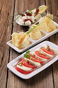 起司开胃菜木头小吃西红柿拼盘食物奶制品矩形卷发豆芽黄油图片